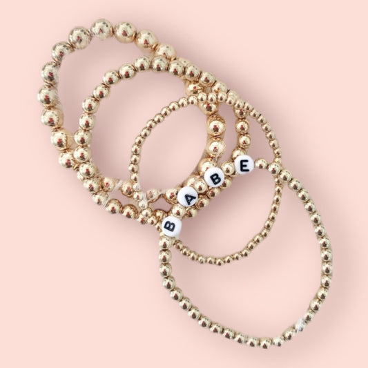 Gold Beaded Bracelet Stack: Personalized Letter Bead Stretchy Set